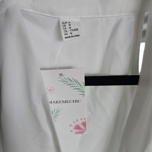 Chic White Sleeveless Wrap Blouse - Picture 7 of 7